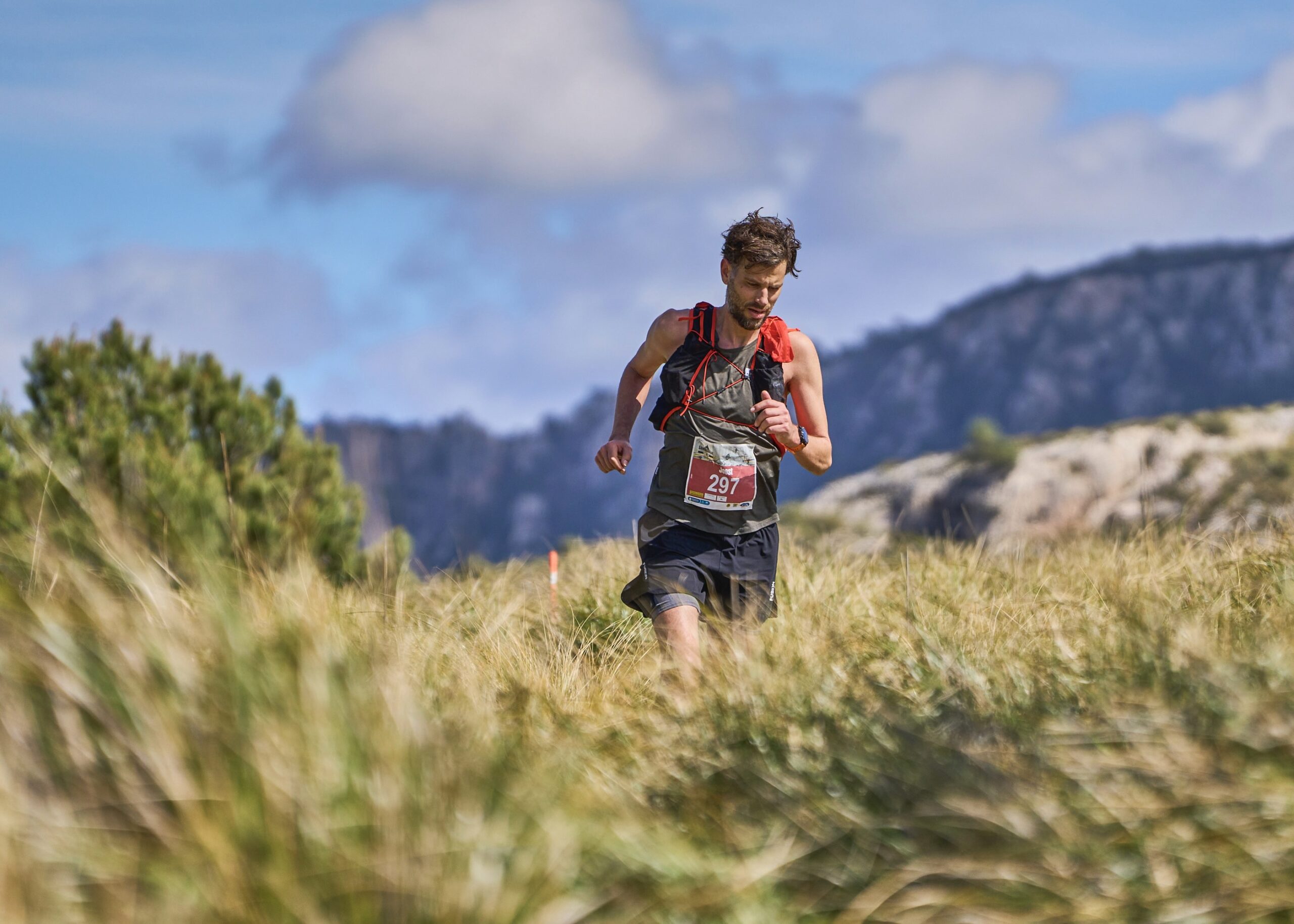 Joost running along the rugged trails of the Galatzó Trail 2024, navigating the challenging mountain terrain.