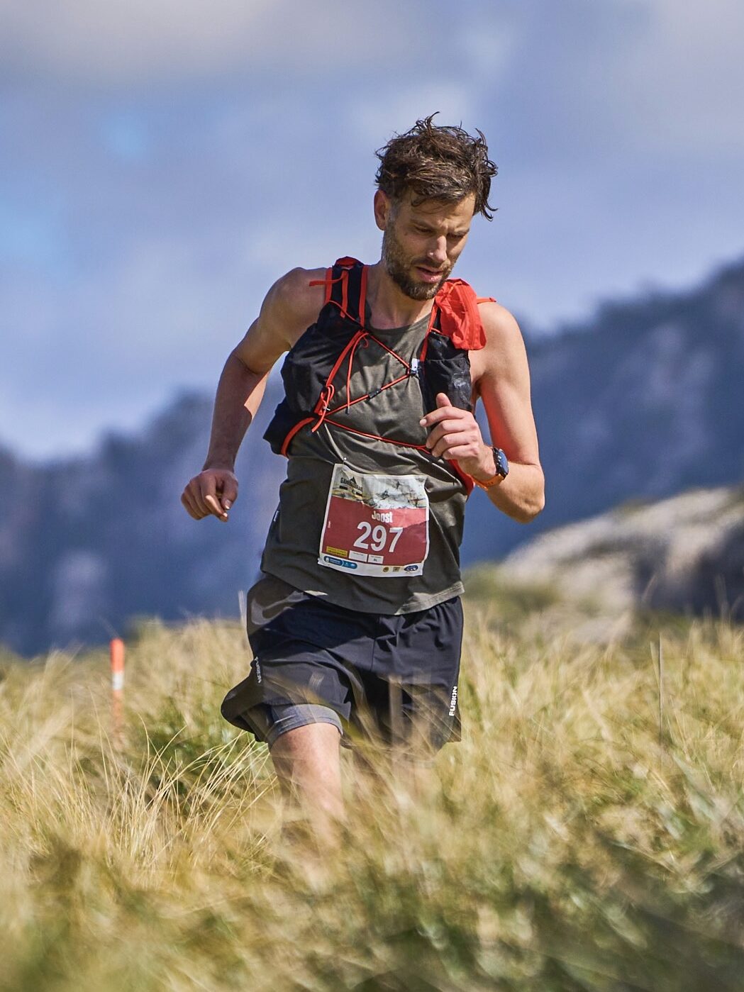 Joost running along the rugged trails of the Galatzó Trail 2024, navigating the challenging mountain terrain.