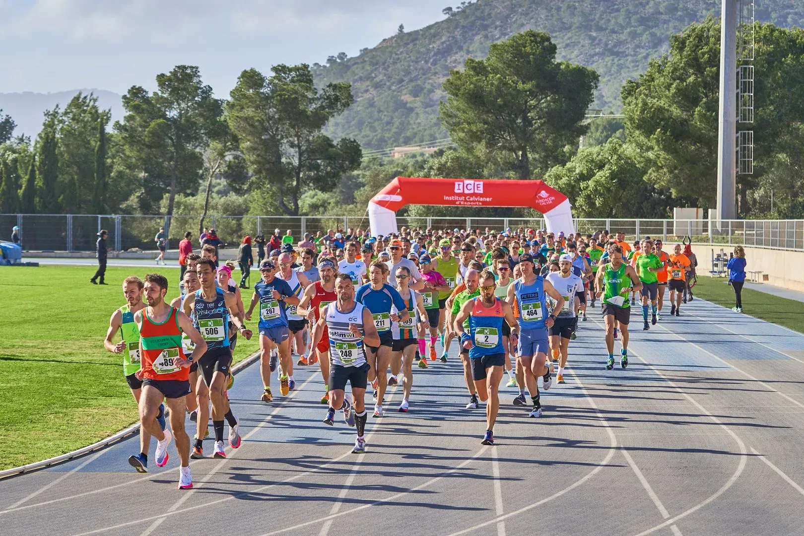 Runners at the start of the Magaluf Half Marathon 2025, racing along the scenic Mallorca coastline.