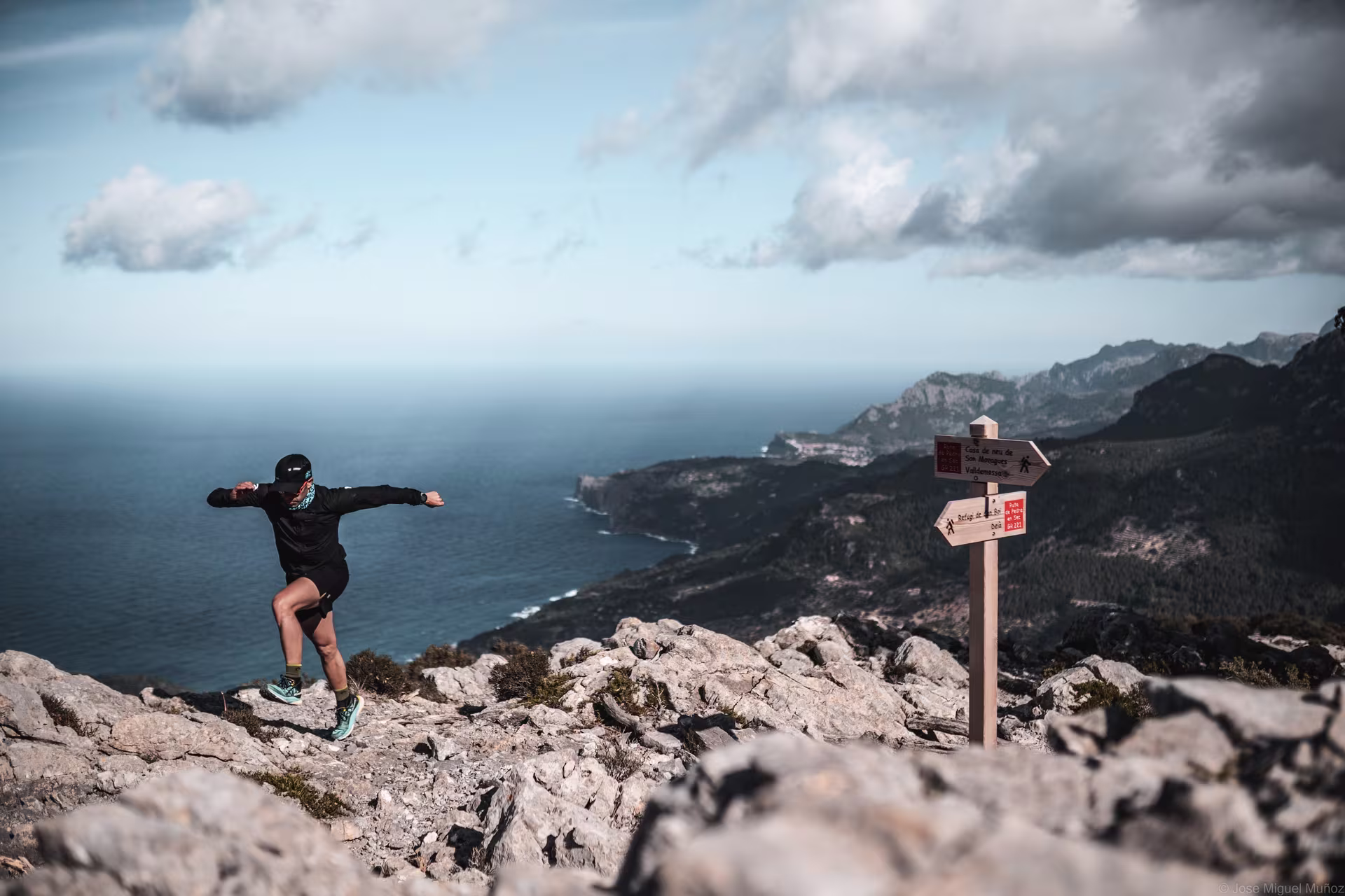 Trail runner tackling the rugged mountains of UTMB Mallorca 2025, pushing their limits in an epic ultra-distance race.